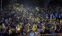 Catholics attend a Palm Sunday celebration at the Metropolitan Cathedral in Caacupe April 13, 2014. Palm Sunday commemorates Jesus Christ's triumphant entry into Jerusalem on the back of a donkey. REUTERS/Jorge Adorno (PARAGUAY - Tags: RELIGION)