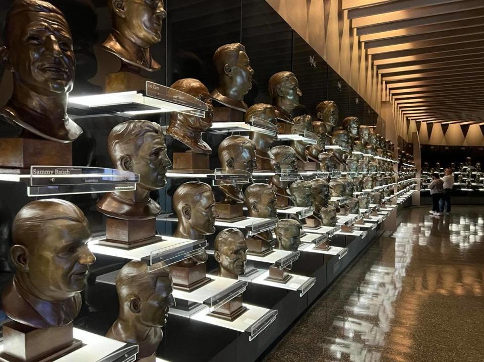 The gallery of the Pro Football Hall of Fame houses the bronze busts of 354 inductees.