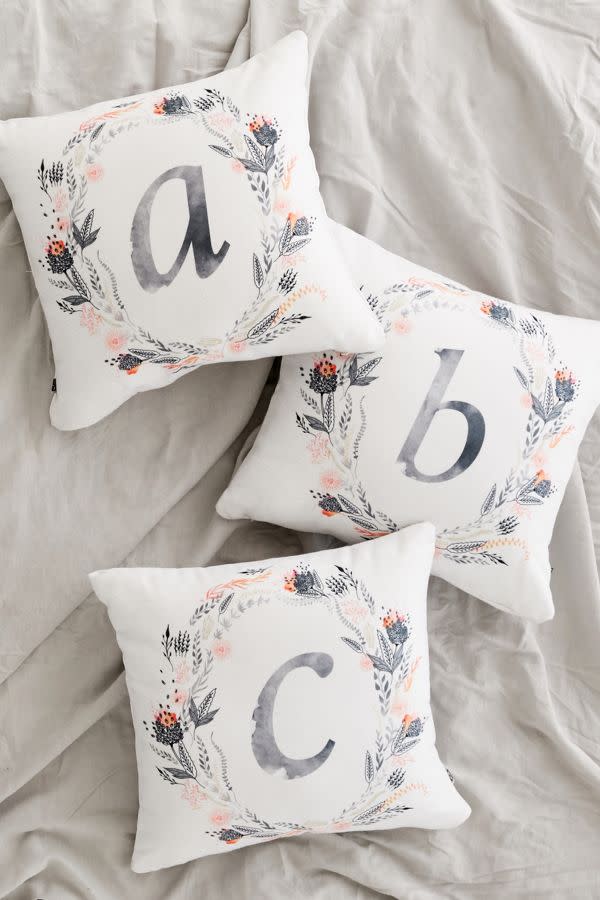 <p>Personalized gifts are great but can often cost a pretty penny. Keep it simple by opting for an initialed monogram throw pillow in a neutral color scheme that your BFF will love.<br><strong><a rel="noopener" href="https://fave.co/2Qpki8u" target="_blank" data-ylk="slk:SHOP IT;elm:context_link;itc:0;sec:content-canvas" class="link ">SHOP IT</a>:</strong> $44, <a rel="noopener" href="https://fave.co/2Qpki8u" target="_blank" data-ylk="slk:urbanoutfitters.com;elm:context_link;itc:0;sec:content-canvas" class="link ">urbanoutfitters.com</a> </p>