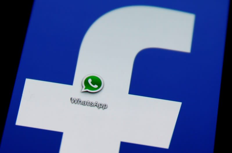 FILE PHOTO: A Whatsapp icon is seen on a Samsung Galaxy S4 phone screen with a Facebook logo in the central Bosnian town of Zenica