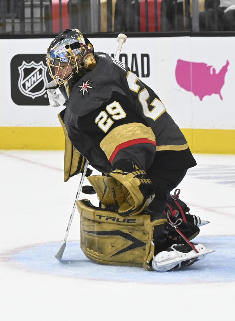 Vegas Golden Knights goaltender Marc-Andre Fleury (29) stops the puck during the third period of Game 1 of a first-round NHL hockey playoff series against the Minnesota Wild, Sunday, May 16, 2021, in Las Vegas. (AP Photo/David Becker)