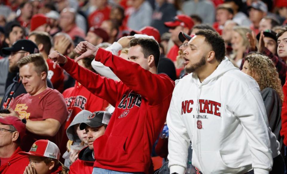 Wolfpack fans boo during the first half of N.C. State’s game against Florida State at Carter-Finley Stadium in Raleigh, N.C., Saturday, Oct. 8, 2022.
