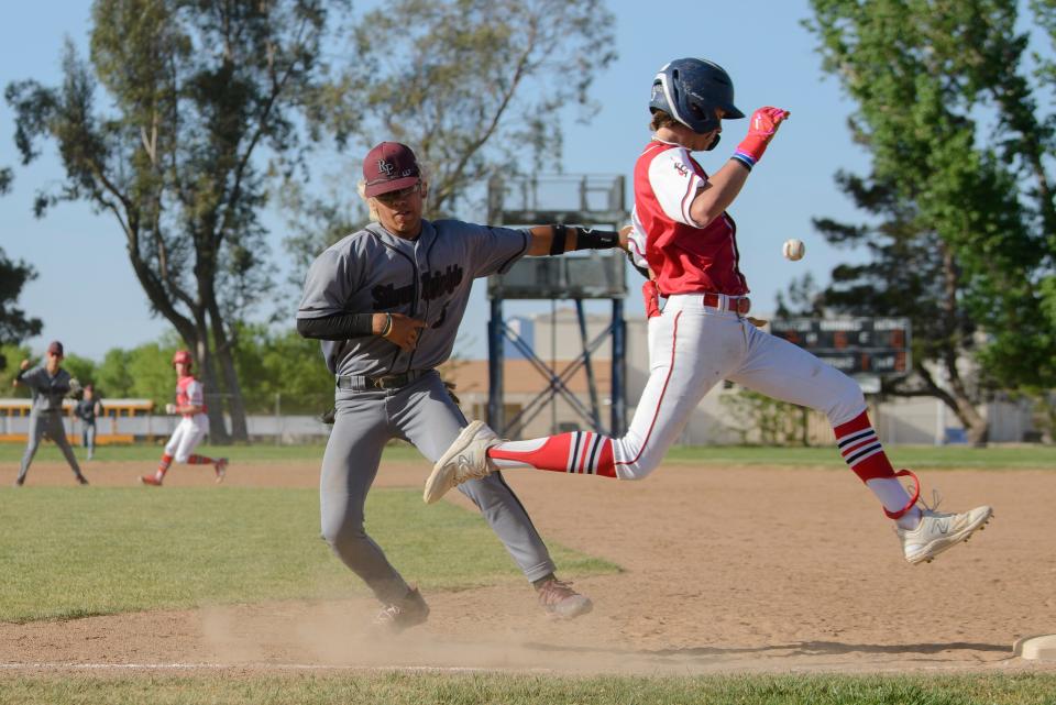Riverside Prep’s Ethyn Beltran loses the ball while trying to tag Hesperia Christian’s Caleb Audet during the sixth inning on Tuesday, April 25, 2023. Hesperia Christian defeated Riverside Prep 3-2 to force a tie atop the Cross Valley League standings.