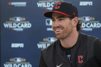 Cleveland Guardians pitcher Shane Bieber smiles during an interview, Thursday, Oct. 6, 2022, in Cleveland, the day before their wild card baseball playoff game against the Tampa Bay Rays, . (AP Photo/Sue Ogrocki)