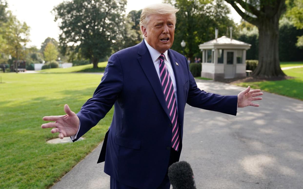 U.S. President Donald Trump talks to reporters as he departs for campaign travel to Minnesota from the South Lawn at the White House in Washington, U.S., September 18, 2020 - Kevin Lamarque/Reuters