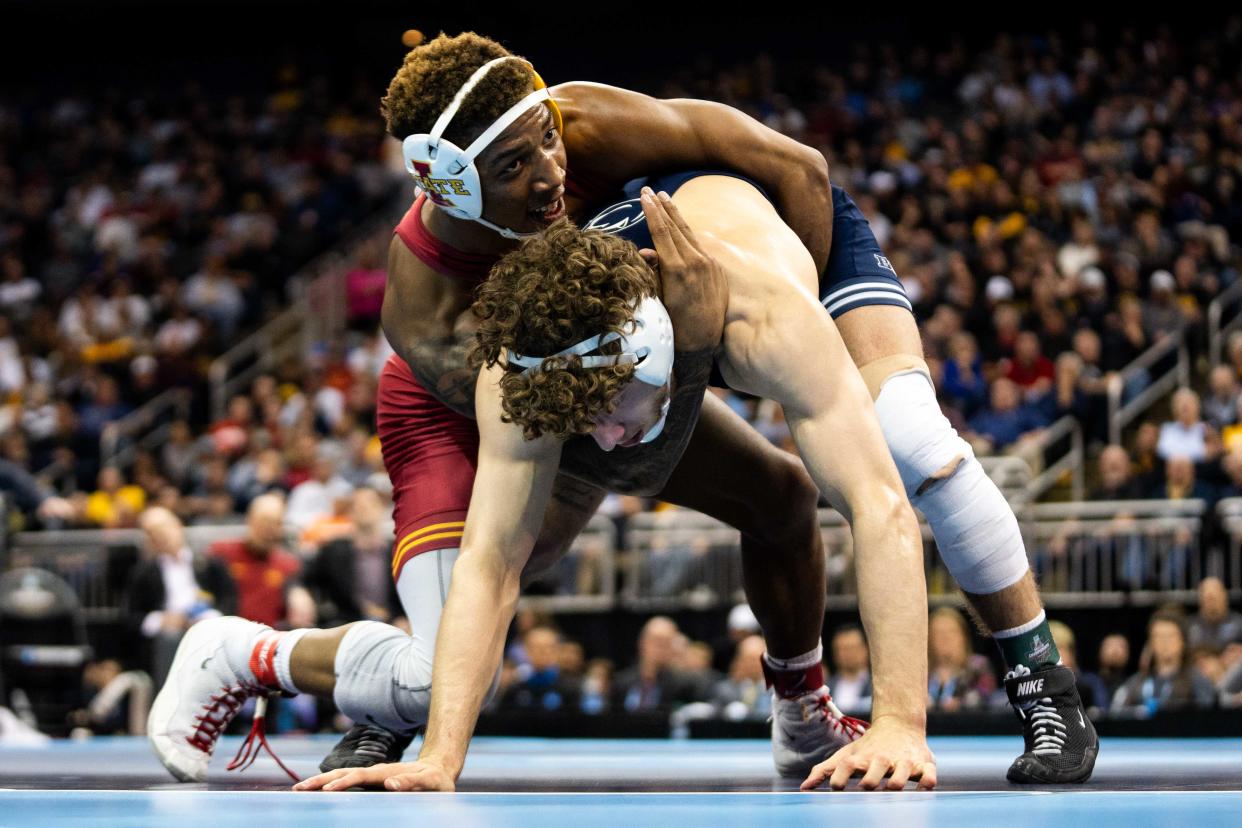 ISU's David Carr wrestles Penn State's Mitchell Mesenbrink in the 165 lbs. NCAA final Saturday, March 23, 2024, at the T Mobile Center in Kansas City.