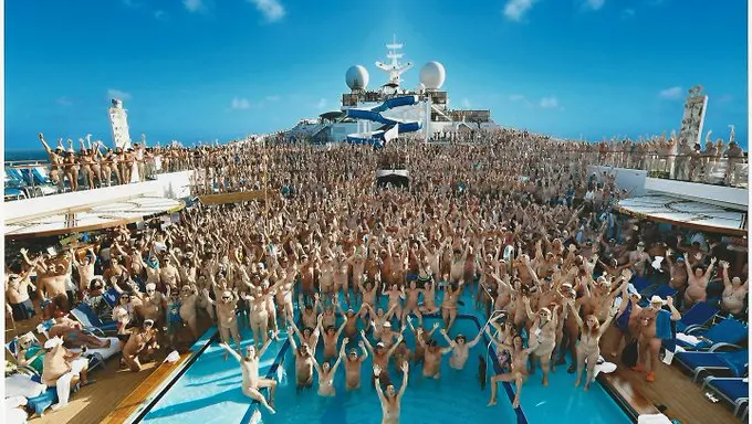 The 968-foot vessel, which can accommodate up to 2,300 passengers, has been renamed “The Big Nude Boat” for the journey. Norwegian Cruise Line