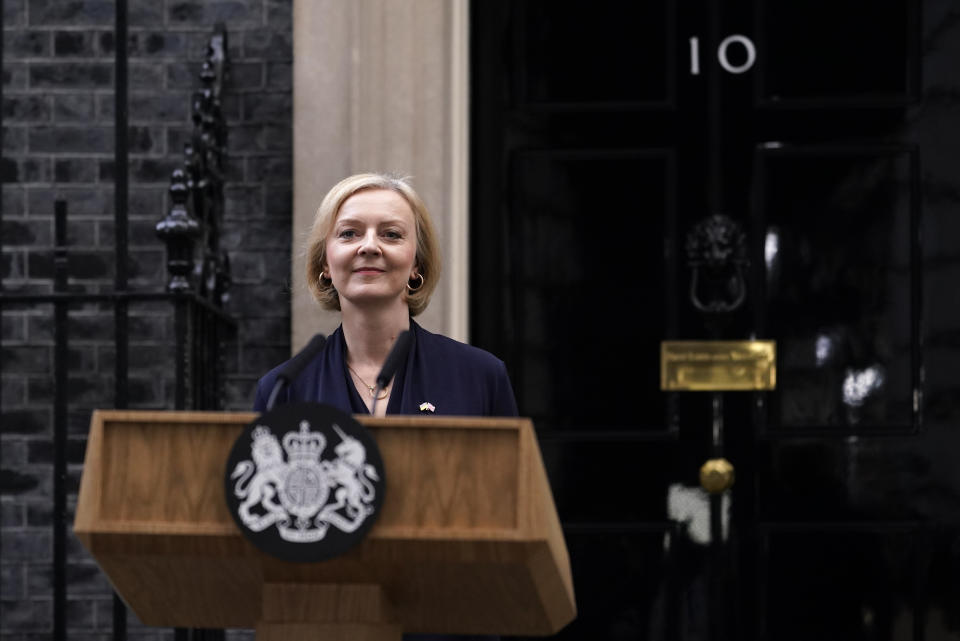 Britain's Prime Minister Liz Truss arrives to address the media in Downing Street in London, Thursday, Oct. 20, 2022. British Prime Minister Liz Truss resigned Thursday — bowing to the inevitable after a tumultuous six-week term in which her policies triggered turmoil in financial markets and a rebellion in her party obliterated her authority. (AP Photo/Alberto Pezzali)