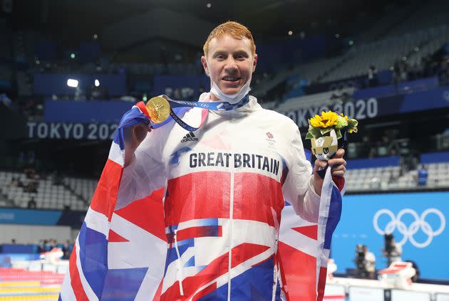 Tom Dean of Great Britain poses with his medal after winning the Men's 200m Freestyle final on day four of the Tokyo 2020 Olympic Games  (Photo: Ian MacNicol via Getty Images)