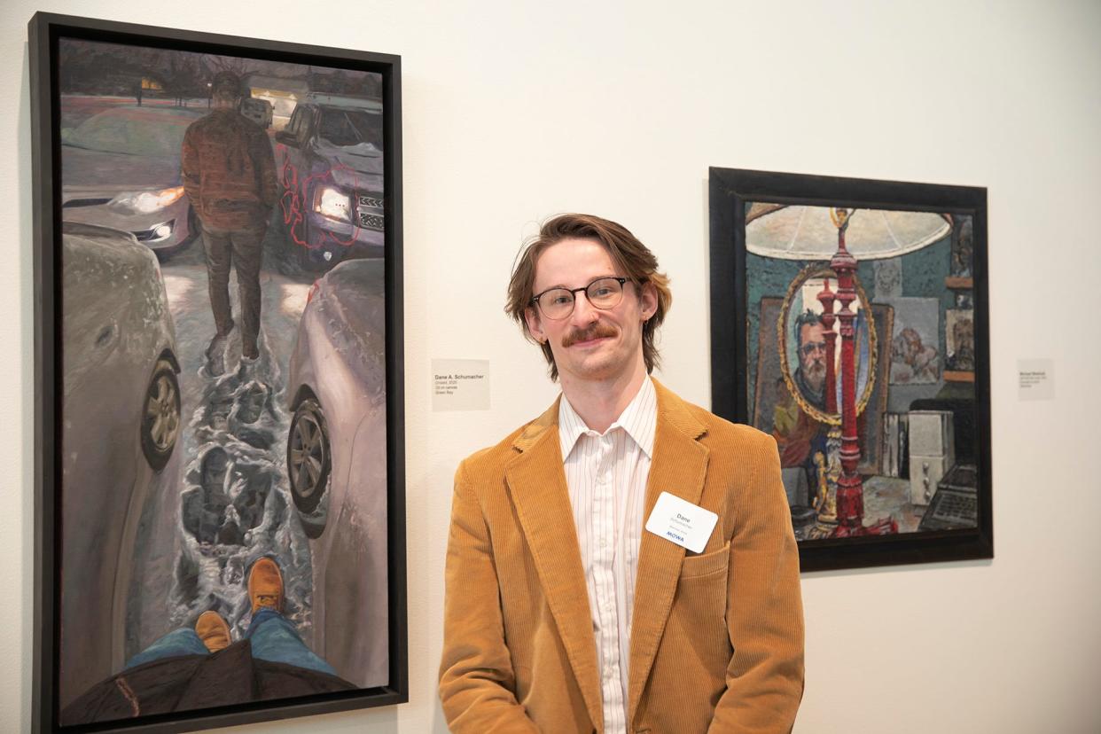 Green Bay artist Dane Schumacher was awarded second place and $2,000 for his painting, "Unsaid," in the "Wisconsin Artists Biennial" at the Museum of Wisconsin Art in West Bend. The competitive juried exhibition drew submissions from nearly 400 artists.