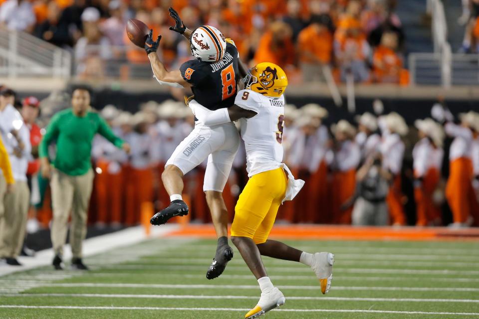 Oklahoma State's Braydon Johnson (8) leads the team in receptions, yards and touchdowns through three games.