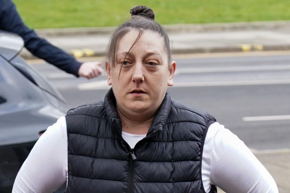 Sarah Lloyd-Jones arrives at Swansea Crown Court, to be sentenced along with Alun Titford, for manslaughter by gross negligence of their obese teenage daughter who was found dead in 