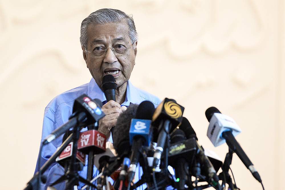 Tun Dr Mahathir Mohamad does not mind being removed from his party position as long as it is lawfully done in accordance with the party’s constitution and regulations instead of a backdoor move to oust him. — Picture by Miera Zulyana
