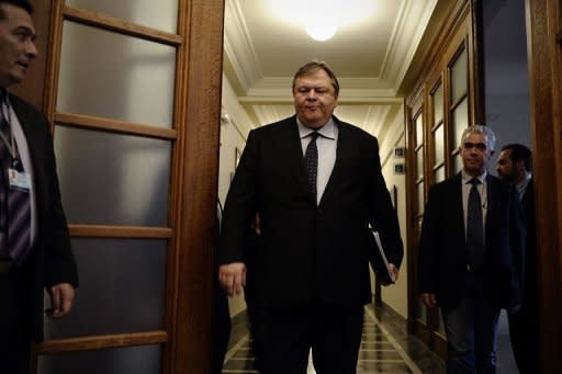 Greek Finance Minister Evangelos Venizelos arrives at a cabinet meeting in Athens on February 14