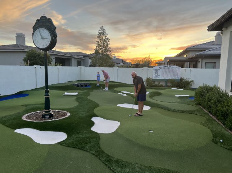 Andrew Augustyniak created a miniature version of Augusta National Golf Club in his backyard in Gilbert, Ariz.