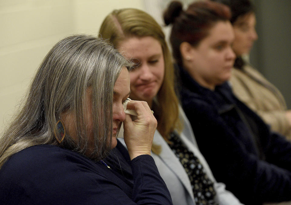 Michelle Raftery, who was a foster mother for Harmony Montgomery, reacts to Kayla Montgomery being granted parole during her hearing at the New Hampshire Correctional Facility for Women in Concord, N.H., on Thursday, March 7, 2024. Kayla Montgomery, the estranged wife of Adam Montgomery, convicted of killing his 5-year-old daughter and moving the body around for months, has been granted parole more than a year after she was sentenced to prison for lying about where she was when the child was last seen. (David Lane/Union Leader via AP, Pool)