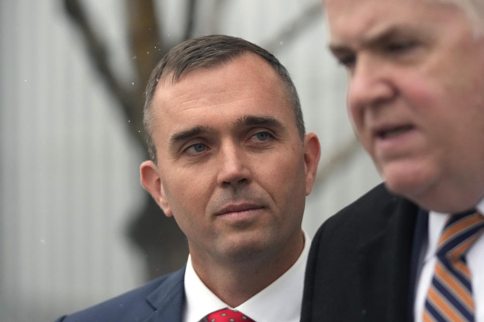 Former Delta Air Lines pilot Jonathan J. Dunn, left, stands with his attorney following his first federal court appearance Thursday, Jan. 4, 2024, in Salt Lake City. Dunn, who was the first officer, or co-pilot, threatened to shoot the captain during a heated argument in the cockpit over whether to change course to accommodate a passenger's medical issue. (AP Photo/Rick Bowmer)