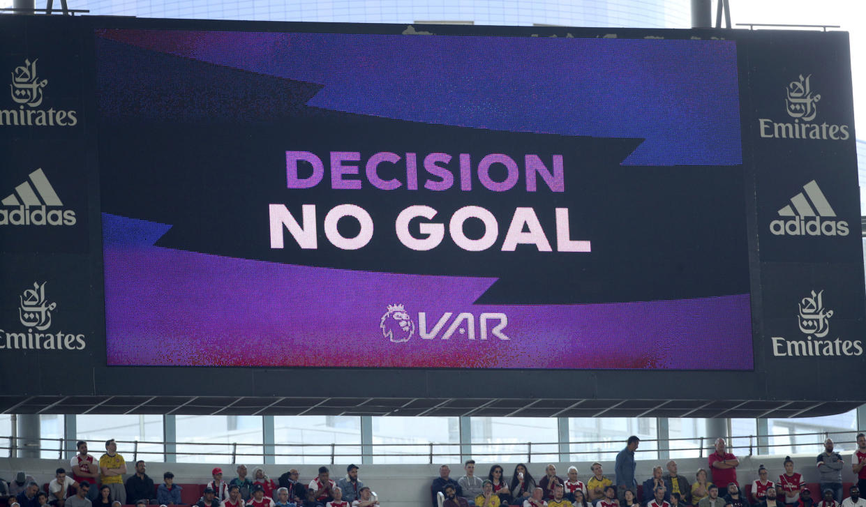 The VAR Referral screen shows a no goal decision, during the English Premier League soccer match between Arsenal and Burnley FC, at The Emirates Stadium, in London, Saturday, Aug. 17, 2019. (Yui Mok/PA via AP)