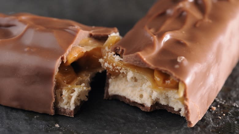 Close-up of a Snickers bar cut in half
