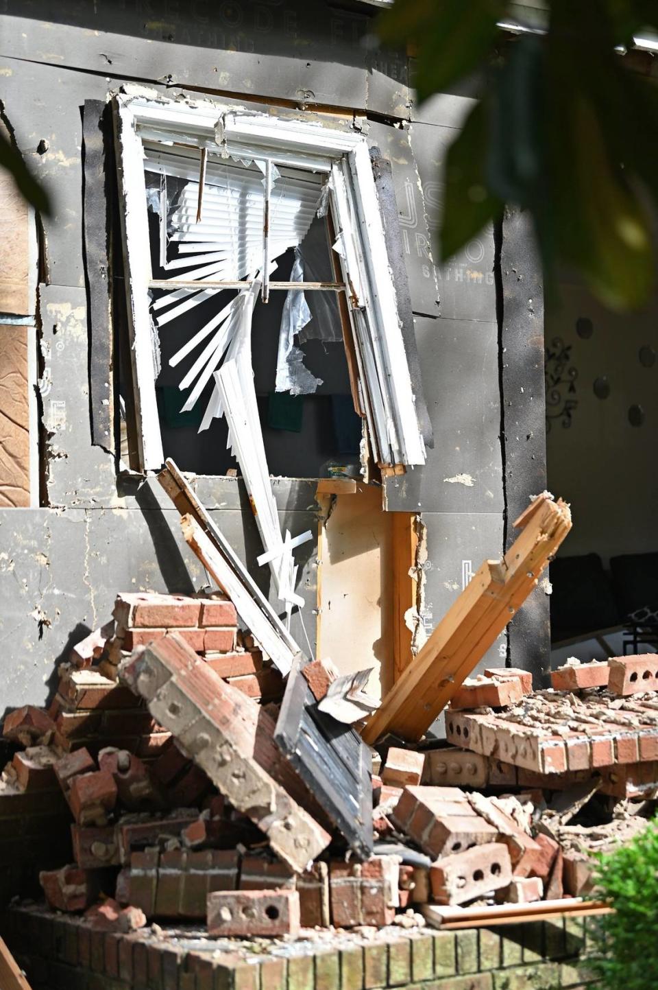 Debris is strewn out of the home at 5525 Galway Drive where three members of the U.S. Marshals task force and a CMPD Officer Joshua Eyer were killed on Monday, April 29, 2024 when they were serving a warrant to the suspect. Four other officers were wounded during the shooting.