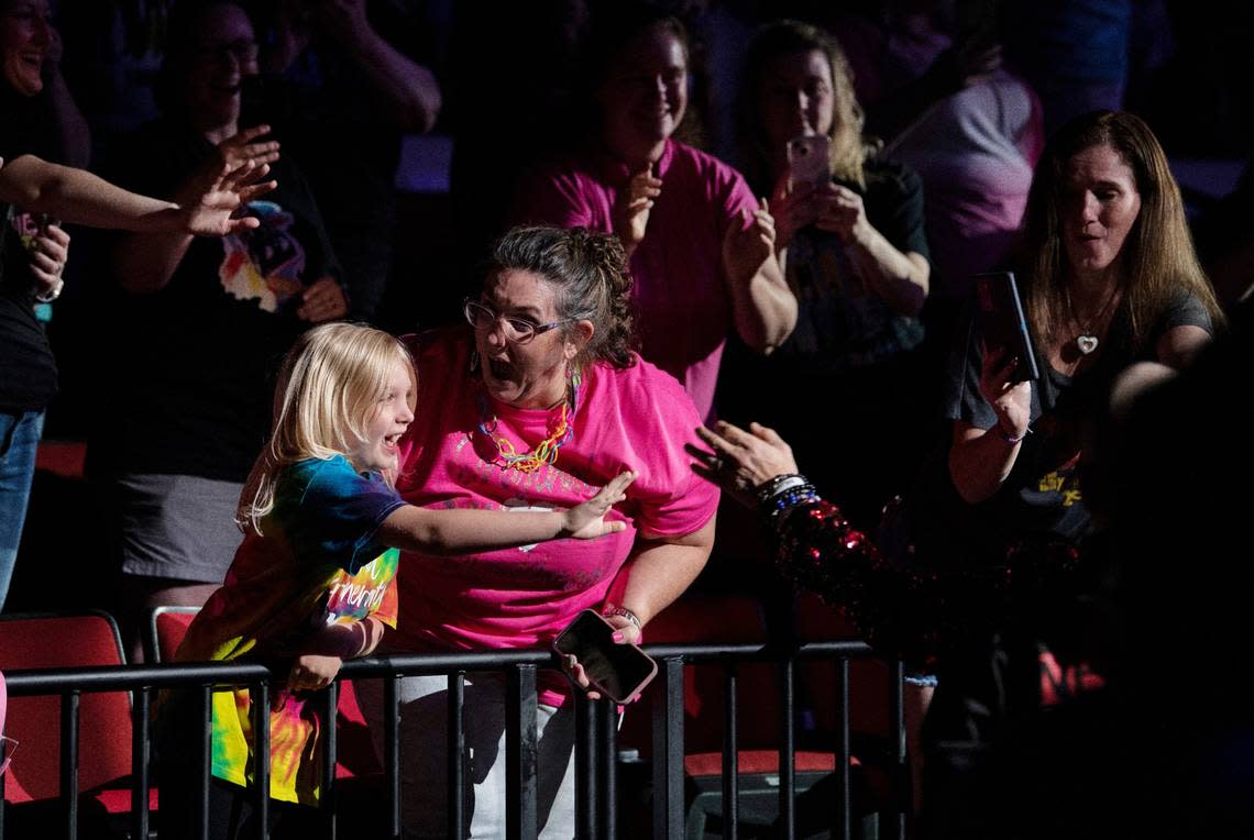 Excited fans react after high-fiving Donnie Wahlberg as New Kids on the Block thanks the crowd on the “Mixtape 2022 Tour” at Raleigh, N.C.’s PNC Arena, Friday night, July 22, 2022.