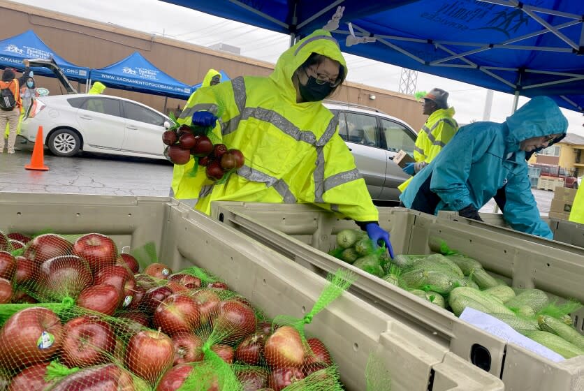 Xia Moua volunteers at Sacramento Food Bank & Family Services