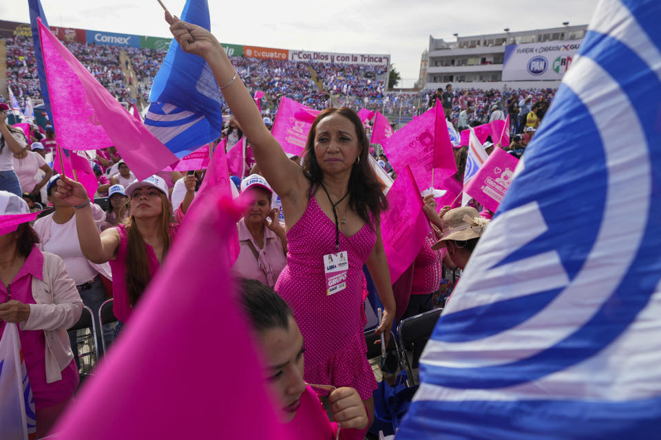 Supooterts of Presidential candidate Xóchitl Galvez attend her opening campaign rally in Irapuato, Mexico, Friday, March 1, 2024. General Elections are set for June 2.(AP Photo/Fernando Llano)