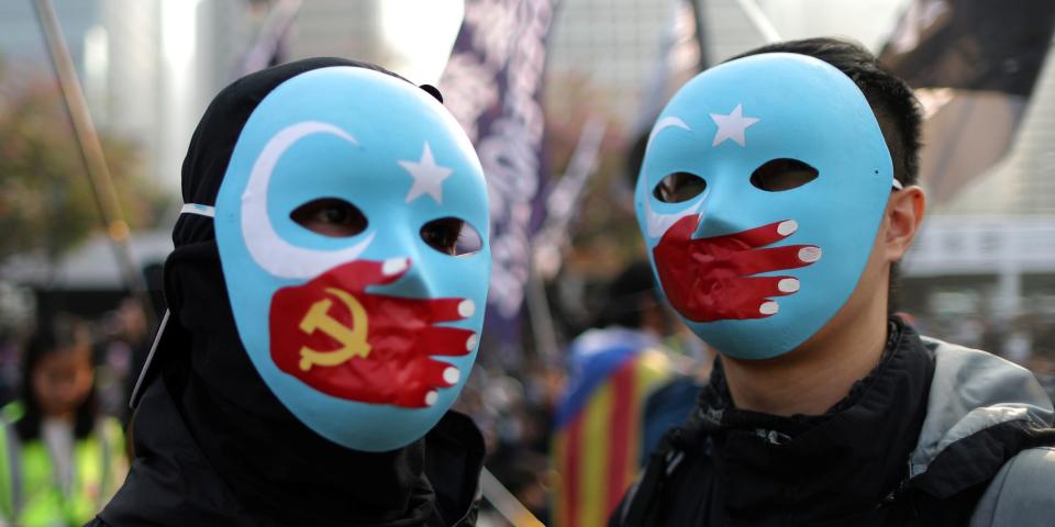 Hong Kong Uighur protest masks.JPG