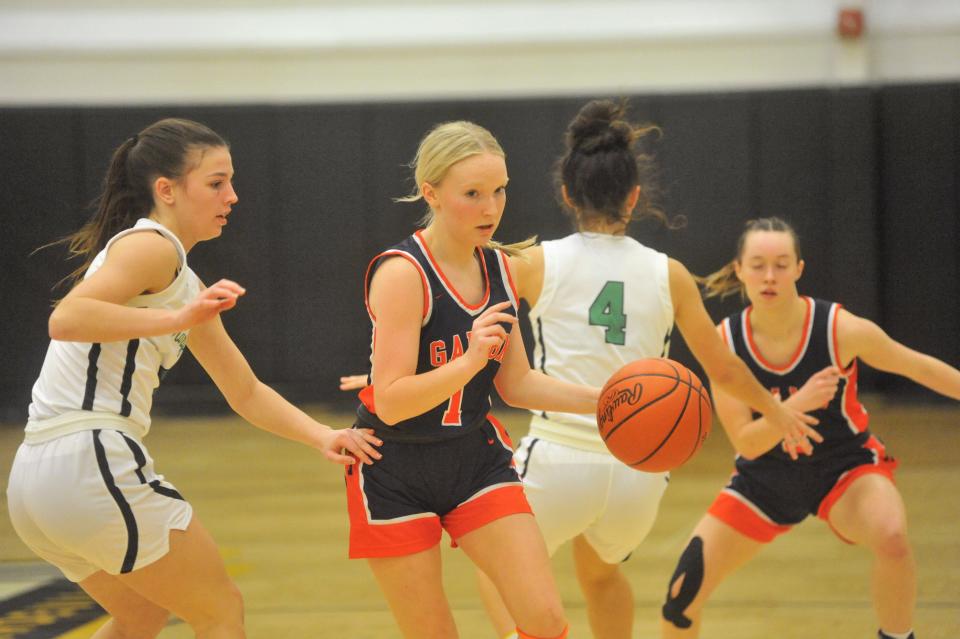 Galion's Bianca White drives into the paint.