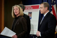 Acting AAG for National Security Mary McCord speaks in front of a poster of a suspected Russian hacker during FBI National Security Division and the U.S. Attorney's Office for the Northern District of California joint news conference at the Justice Department in Washington, U.S., March 15, 2017. REUTERS/Yuri Gripas