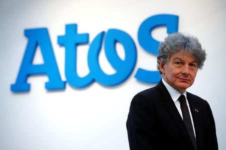 FILE PHOTO - Atos Chairman and CEO Thierry Breton poses in front of the company's logo during a presentation of the new Bull sequana supercomputer in Paris, France, April 12, 2016. REUTERS/Philippe Wojazer