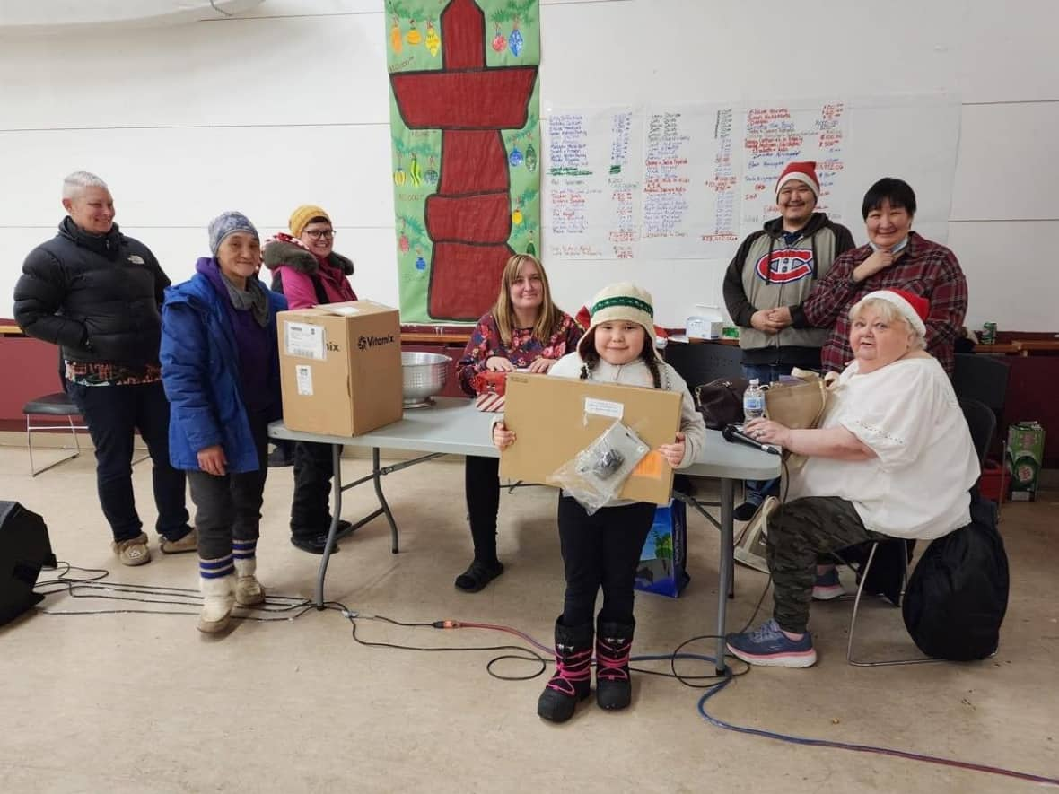 The Kugluktuk Christmas committee preparing for the holidays. There are activities happening all month in the small Nunavut hamlet. (Submitted by Nadene McMenemy. - image credit)