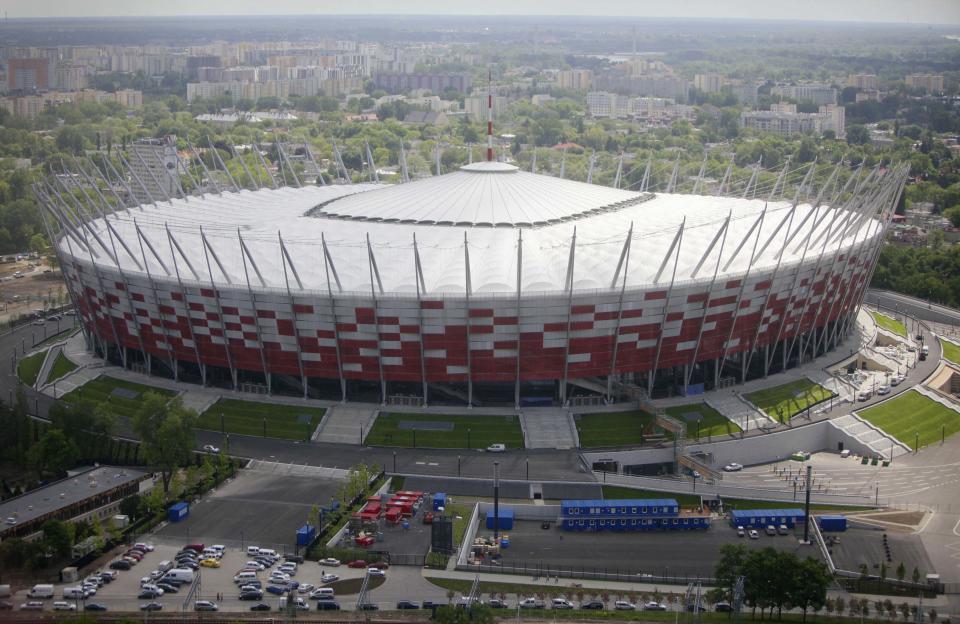FILE - The aerial view made from a hot air balloon shows the new National Stadium, ready for the Euro 2012 football games, in Warsaw, Poland on Friday, May 18, 2012. The stadium is located in one of Warsaw's most popular neighborhoods: Saska Kepa, an enclave of towering trees and homes built in the modernist style of the 1920s and 1930s. The Euro 2012 soccer championship kicks off Friday, June 8, 2012.(AP Photo/Czarek Sokolowski)