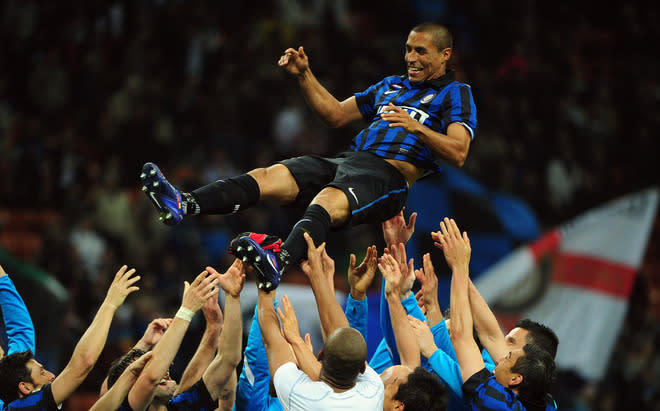 Inter Milan's Colombian defender Ivan Ramiro Cordoba is congratulated by teammates on May 6, 2012 after an Italian Serie A football match against Inter Milan at the San Siro stadium in Milan. AFP PHOTO / OLIVIER MORINOLIVIER MORIN/AFP/GettyImages