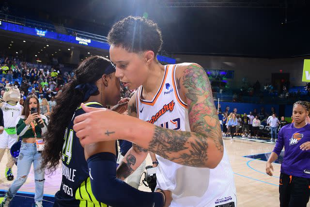 <p>Michael Gonzales/NBAE via Getty</p> From left: Arike Ogunbowale and Brittney Griner