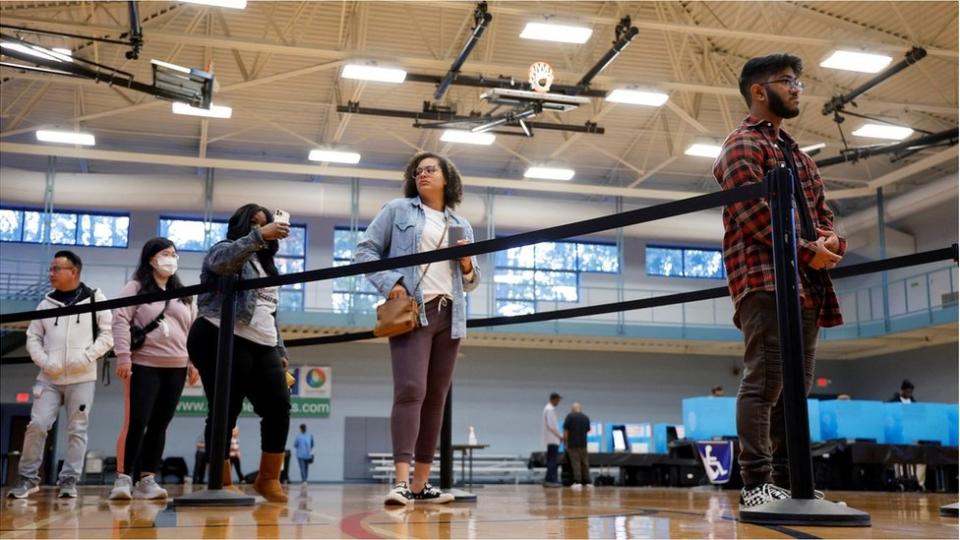 Suburban Atlanta voters in Gwinnett County line up to check in to vote in midterm and statewide elections at Lucky Shoals Park in Norcross, Georgia, U.S. November 8, 2022