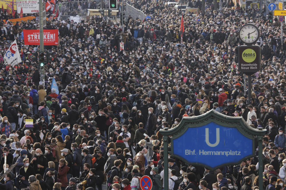 Thousands of protestors attend a May Day rally at the Hermannplatz square in Berlin, Germany, Saturday, May 1, 2021. (AP Photo/Markus Schreiber)