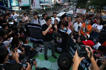 Rangsiman Rome (C) speaks during a protest against junta delaying polls in Bangkok, Thailand January 27, 2018. REUTERS/Athit Perawongmetha