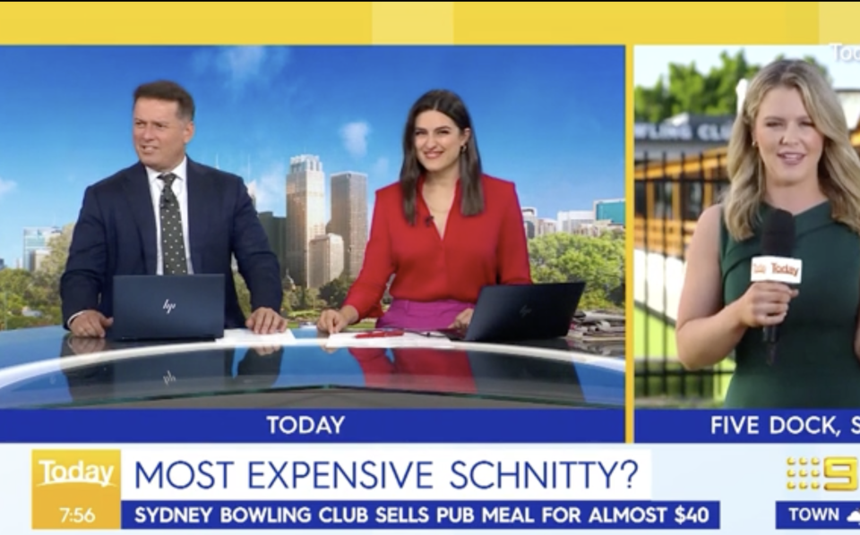 Karl Stefanovic sits behind the Today Show desk with his cohost Sarah Abo.