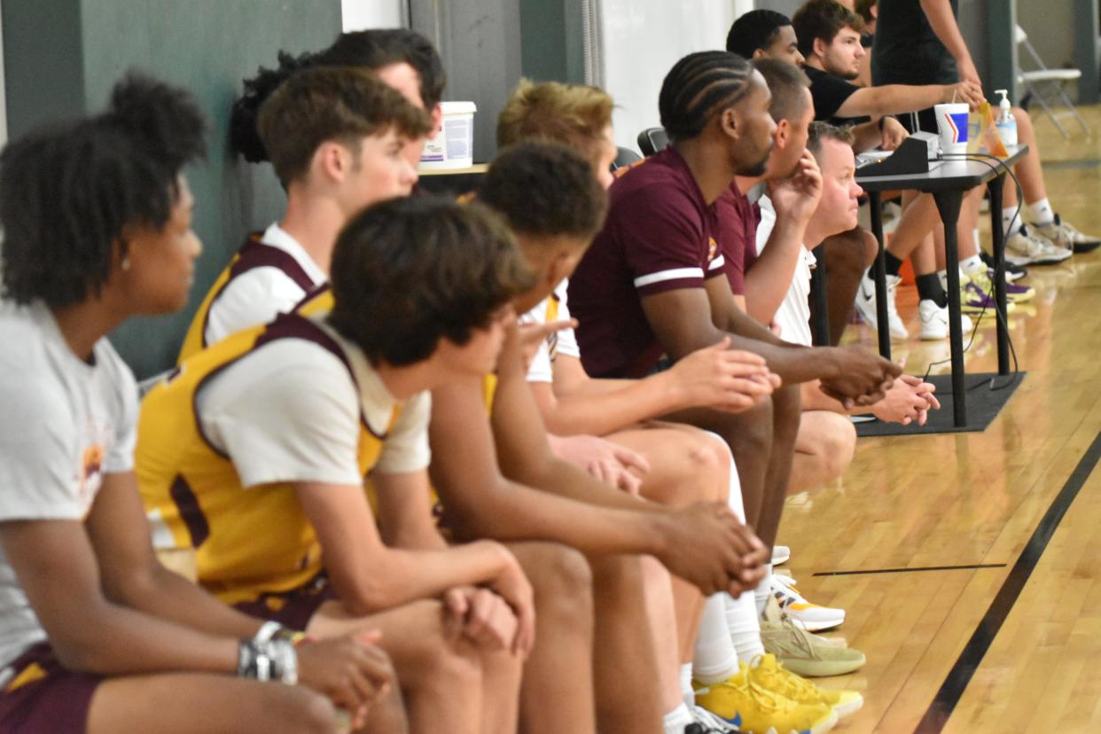 The Bloomington North bench looks on during the Cougars' Bloomington Summer League matchup with Loogootee.