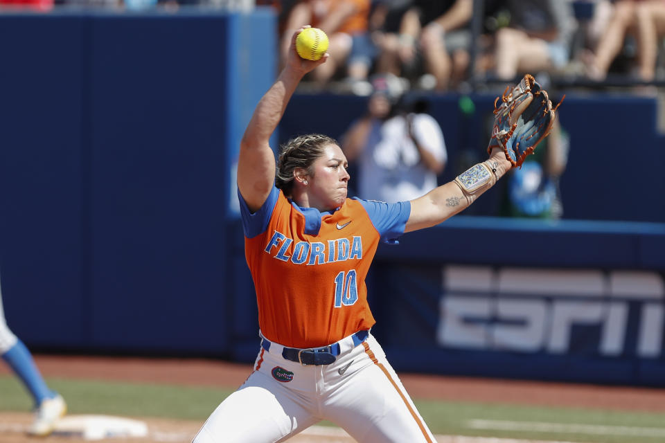 Florida's Natalie Lugo (10) pitches in the fifth inning of an NCAA softball Women's College World Series game against UCLA on Sunday, June 5, 2022, in Oklahoma City. (AP Photo/Alonzo Adams)