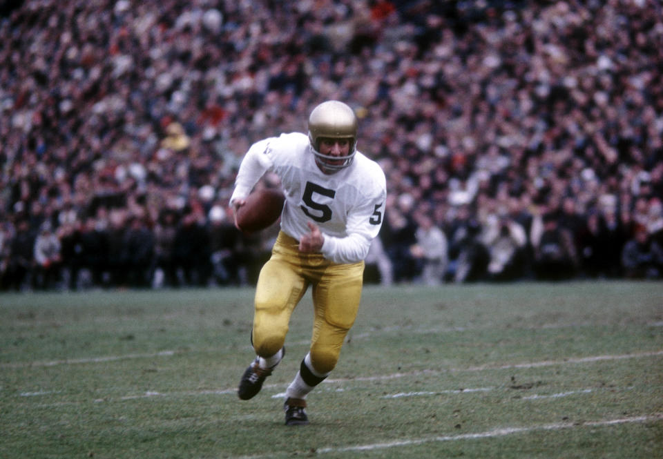 Nov 19, 1966; East Lansing, MI, USA: FILE PHOTO; Notre Dame Irish quarterback (5) Terry Hanratty runs the ball against the Michigan State Spartans. Notre Dame and Michigan State played to a tie 10-10 at Spartans Stadium. Photo By Malcolm Emmons- USA TODAY Sports