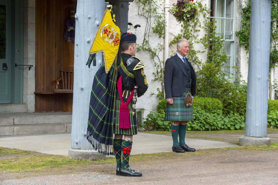 Handout photo issued by Poppy Scotland of the Prince of Wales, known as the Duke of Rothesay when in Scotland, taking a salute as a piper plays during a St Valery commemoration at his Birkhall residence in Scotland. The ceremony is to commemorate the thousands of Scots who were killed or captured during "the forgotten Dunkirk" 80 years ago. Issue date: Friday June 12, 2020. The Second World War battle led to 10,000 mainly Scottish soldiers from the 51st Highland Division being captured at St Valery-en-Caux in France. See PA story ROYAL Pipers. Photo credit should read: Mark Owens/Poppyscotland/PA Wire NOTE TO EDITORS: This handout photo may only be used in for editorial reporting purposes for the contemporaneous illustration of events, things or the people in the image or facts mentioned in the caption. Reuse of the picture may require further permission from the copyright holder.