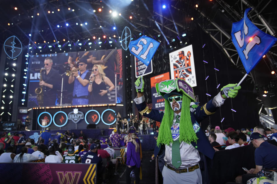 Seattle Seahawks fan Wallace Watts dances during the third day of the NFL draft Saturday, April 30, 2022, in Las Vegas. (AP Photo/John Locher)