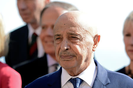 President of the eastern Libyan House of Representatives Aguila Saleh poses for a family photo during the second day of the international conference on Libya in Palermo, Italy, November 13, 2018. REUTERS/Guglielmo Mangiapane