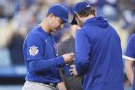 Chicago Cubs' Joc Pederson, left, receives his 2020 World Series ring from Los Angeles Dodgers' Clayton Kershaw before a baseball game in Los Angeles, Thursday, June 24, 2021. (AP Photo/Kelvin Kuo)