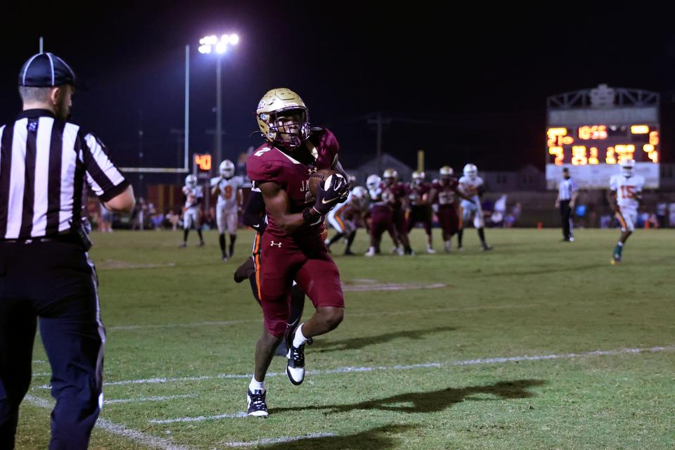 St. Augustine receiver Carl Jenkins Jr. scores a touchdown against Fort Myers Dunbar in the Class 3S football semifinal.