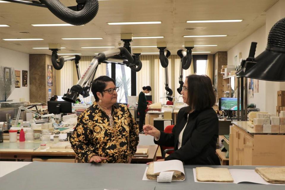 In the documentary ‘Between the Stone and the Flower,’ Havana-born and Miami-raised Genie Milgrom, left, uncovers her family’s hidden Jewish heritage while helping others discover theirs. Courtesy of the Miami Jewish Film Festival