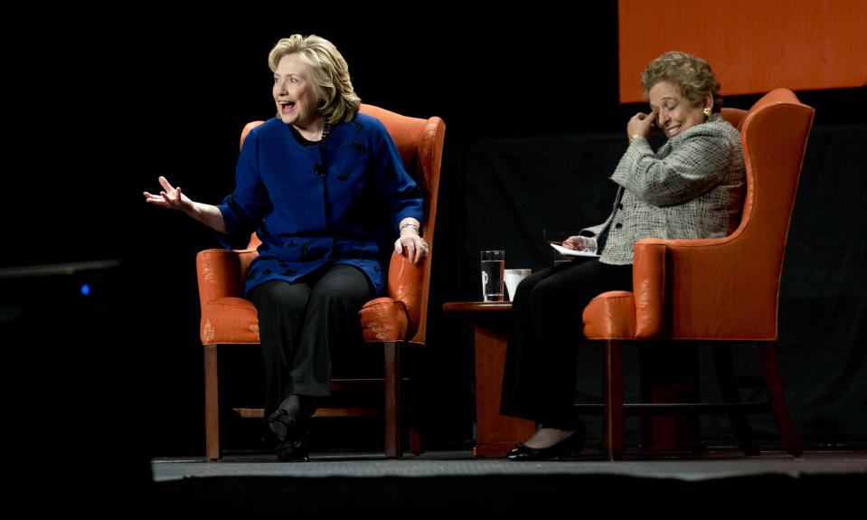 Former secretary of state Hillary Clinton, left, and University of Miami Donna Shalala enjoy a laugh while speaking at the University of Miami in Coral Gables, Fla., Wednesday, Feb. 26, 2014. (AP Photo/J Pat Carter)