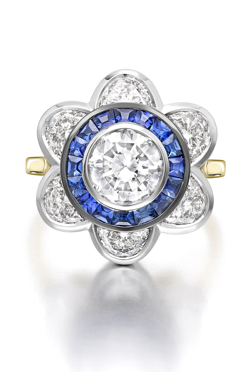 <p><em><strong><strong>Jessica McCormack</strong> </strong>"Moonshine Diamond & Sapphire Daisy Ring" with grey diamond, a halo of carré cut blue sapphires and half-moon shaped diamonds in 18k white and yellow gold, price upon request, <a href="http://www.jessicamccormack.com/" rel="nofollow noopener" target="_blank" data-ylk="slk:jessicamccormack.com;elm:context_link;itc:0;sec:content-canvas" class="link ">jessicamccormack.com</a>.</em></p><p><a class="link " href="http://www.jessicamccormack.com/" rel="nofollow noopener" target="_blank" data-ylk="slk:SHOP;elm:context_link;itc:0;sec:content-canvas">SHOP</a></p>